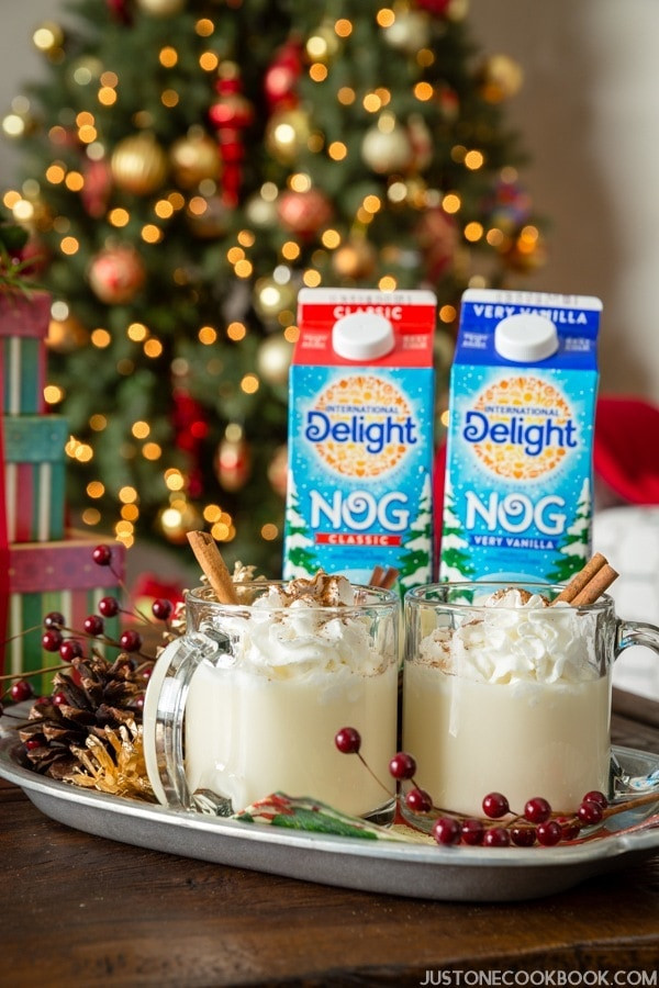 Variety of eggnog serving options, from cartons to glasses, showcasing different ways to enjoy this holiday treat.