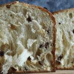 Close-up of panettone slices served with double cream, showcasing a classic way to serve panettone.