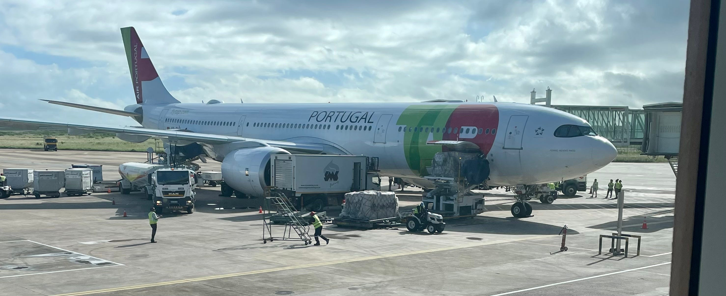 TAP Air Portugal A350 parked at the Maputo Airport: A vibrant image of the aircraft, showcasing the airline's presence in international destinations.