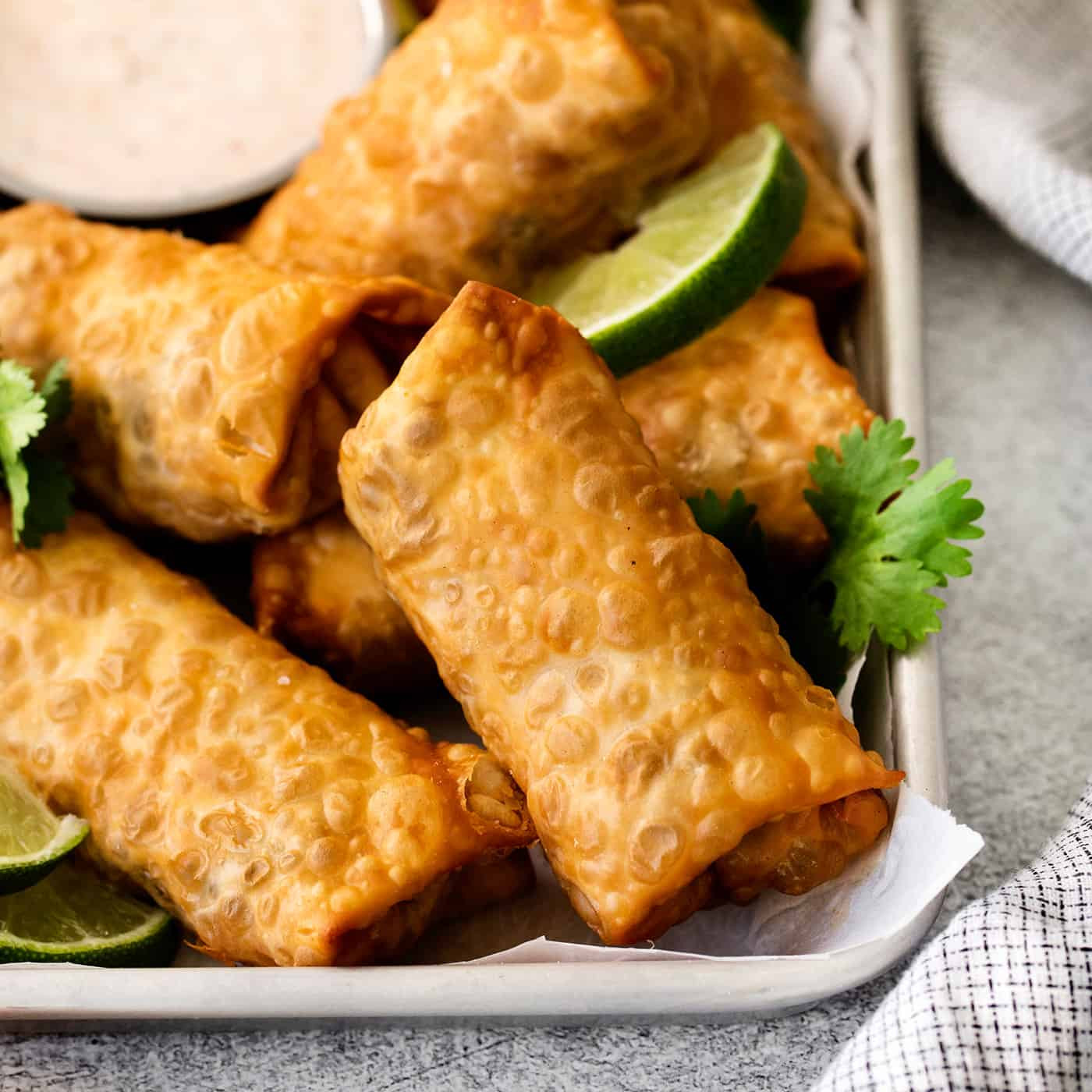 Close-up of fried southwestern egg rolls with a crispy exterior and visible filling